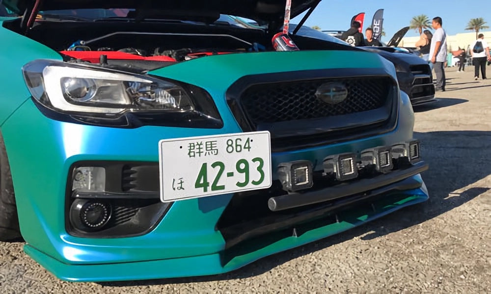 Subaru with custom Japanese license plate