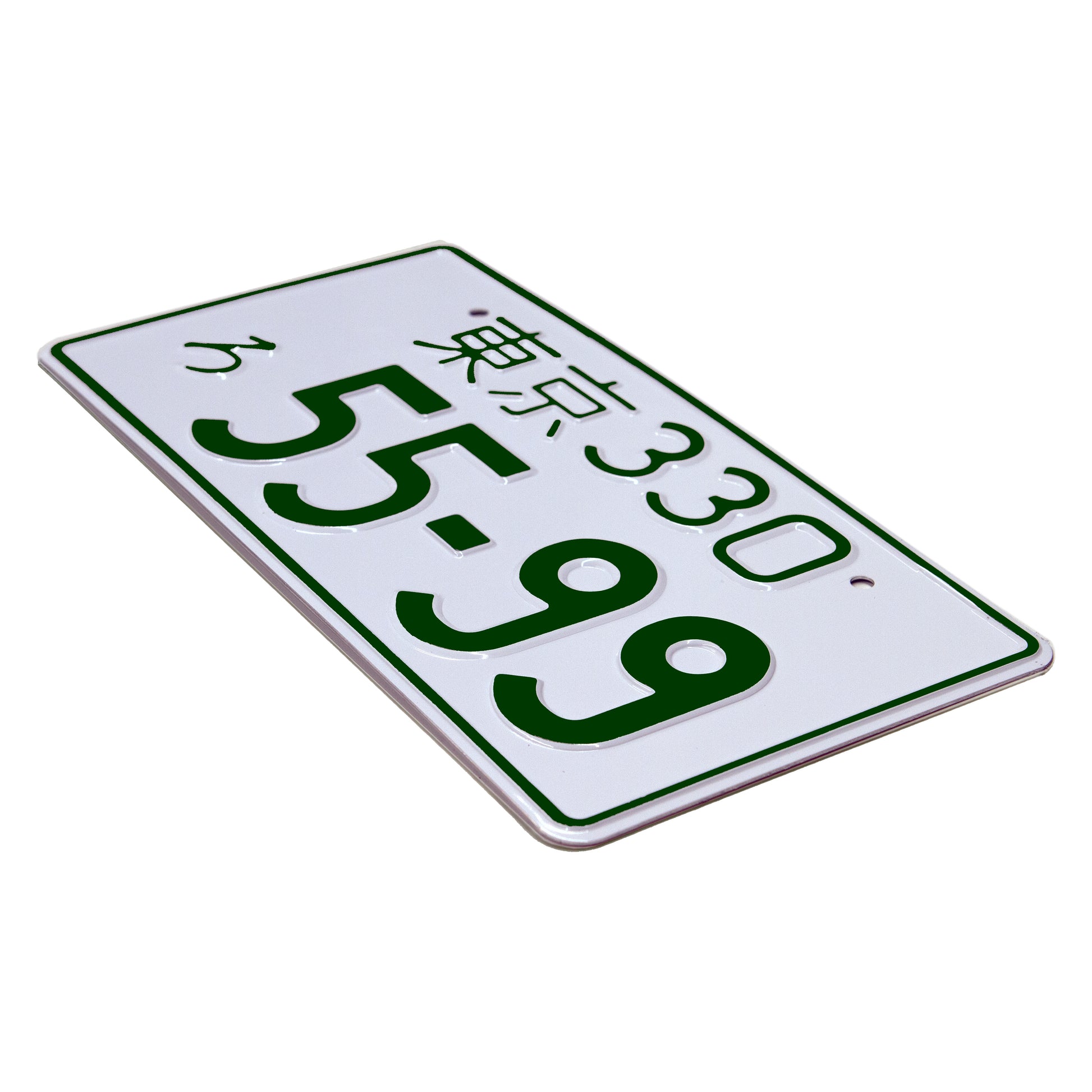Japanese license plate gloss white with green text angle view